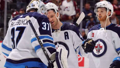 Jets Suspend Connor Hellebuyck as Trade Request Overshadows Camp