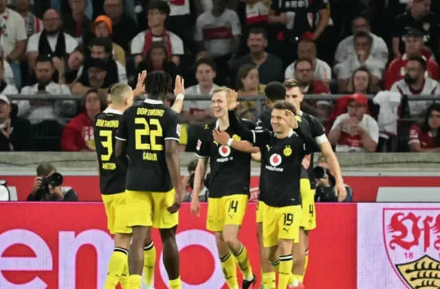 Karetsas Return Helps Dortmund Edge Stuttgart and Stay Top