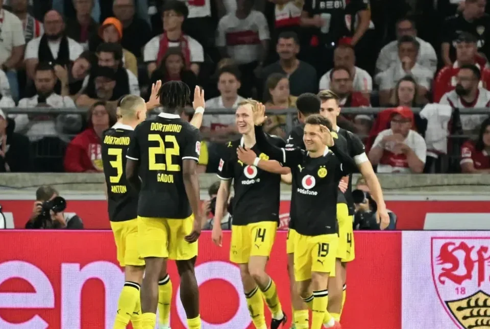 Karetsas Return Helps Dortmund Edge Stuttgart and Stay Top