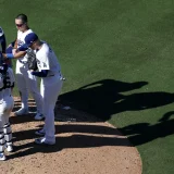 Dodgers Hold Off Braves in NLDS Opener as Phillips Secures Final Out