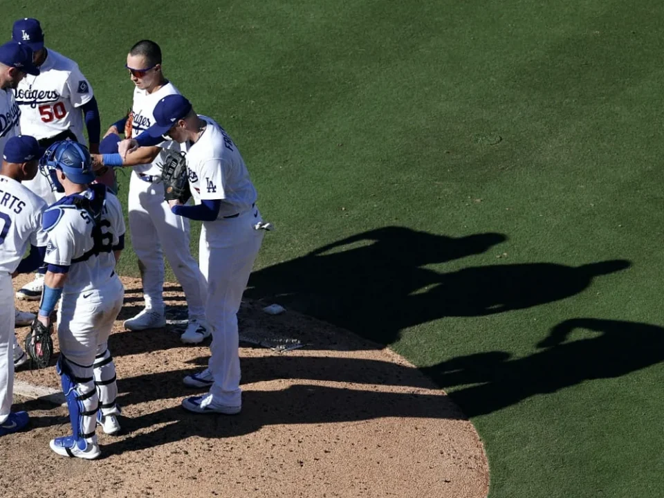 Dodgers Hold Off Braves in NLDS Opener as Phillips Secures Final Out