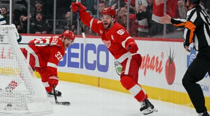 Lucas Raymond Lifts Red Wings Past Sharks in Shootout Thriller