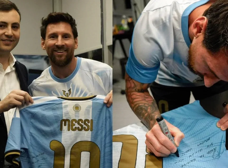 Lionel Messi Presents Signed Argentina Shirt to River Plate Fans