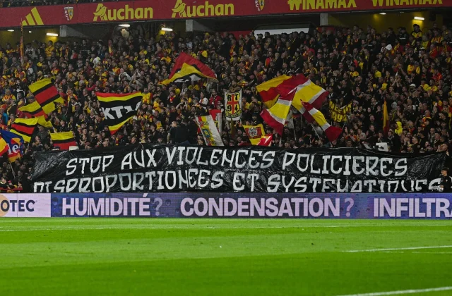 Lens Supporters Unveil Anti-Police Violence Banner During Lyon Match