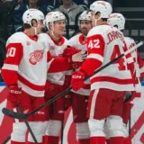 Lucas Raymond Powers Red Wings Past Canucks in 5-2 Road Win