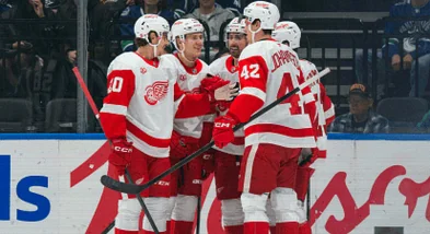 Lucas Raymond Powers Red Wings Past Canucks in 5-2 Road Win