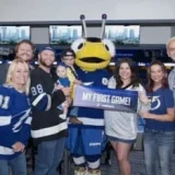ThunderBug reunites with young survivor John Ream at Lightning game