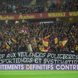 RC Lens Fans Unfurl Anti-Police Violence Banner During Lyon Clash