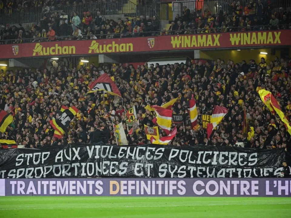 RC Lens Fans Unfurl Anti-Police Violence Banner During Lyon Clash